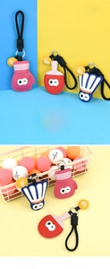 Detail of PU leather sports keychains with boxing glove, racket and shuttlecock charms