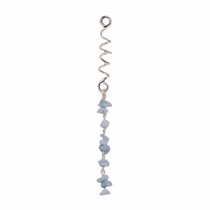 Macro view of silver spiral alloy pendant with light blue stones for braid hair decoration
