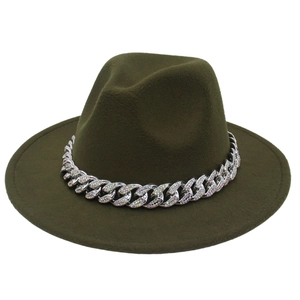 Detail view of dark green felt fedora hat featuring a chunky rhinestone acrylic chain