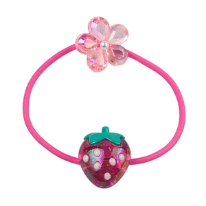 Cute pink floral and strawberry hair ties for girls with pearl details on white background