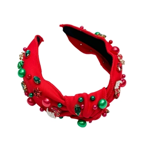 Red Christmas knotted headband with green pearls, red rhinestones and Santa charms