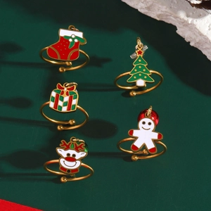 5-piece Christmas stainless steel open ring set with deer and tree pendants on green background