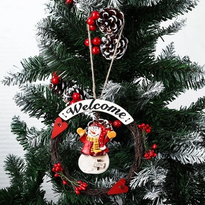 Christmas wreath with snowman and berries featuring Welcome sign and SNOW lettering