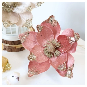 Close-up of velvet Christmas flower with glitter edges and elegant floral details