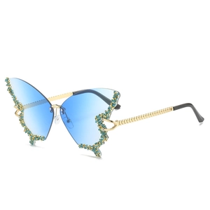 Fashion butterfly rimless sunglasses with blue lenses and green rhinestones on gold frame