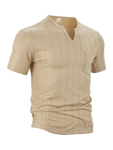 Detail view of khaki V-neck polyester shirt with pocket and vertical texture