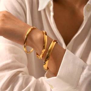 Three-piece gold plated stainless steel bangles set with minimalist side opening