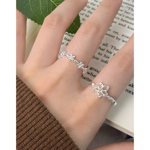 S925 Sterling silver floral ring set featuring a large hollow flower and small petal band