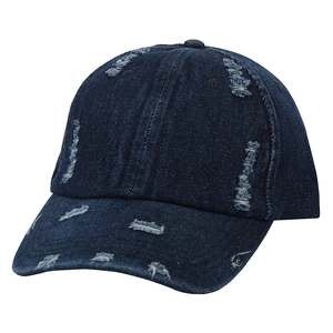 Detail shot of heavy distressed denim baseball cap with vintage washed torn elements