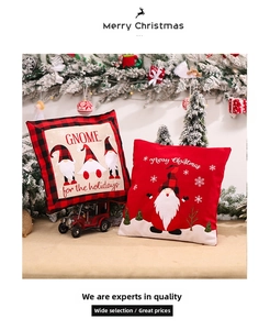 Detail of Christmas gnome pillow covers with plaid patterns and Merry Christmas text