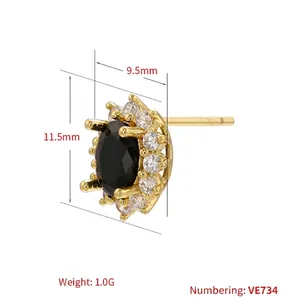 Elegant gold micro-pave earrings with black oval gemstone and white cubic zirconia halo