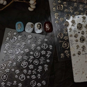 Detailed 3D embossed rose nail art stickers with gold and silver metallic flower accents