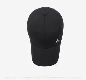 Top view of a black quick-dry sports cap featuring a white sailboat print and logo