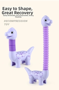 Detail showing flexible purple dinosaur pop tube toy in retracted and extended states