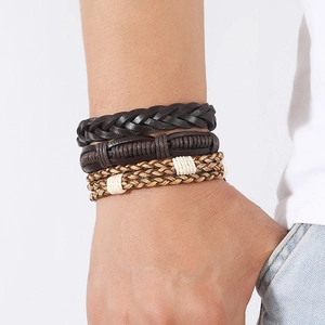Set of three vintage braided leather bracelets in dark brown, brown and beige tones