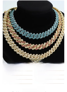 Close-up of 14mm micro-pave Cuban chains in gold, silver and rose gold finishes