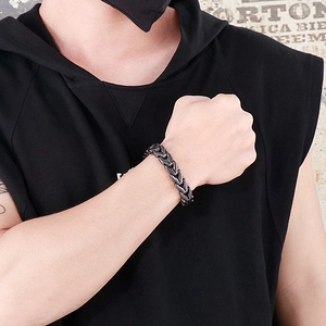Retro punk dragon bone braided steel bracelet for men in matte black finish
