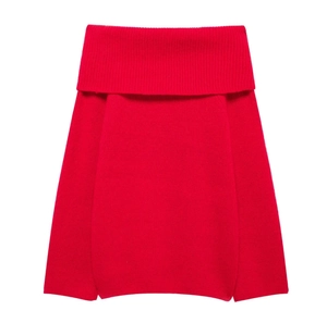 Flat lay of a red off-shoulder knitted sweater with folded collar on white background