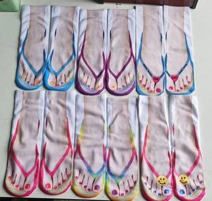 Flat lay view of 6 pairs of low cut socks with realistic 3D flip flop print designs