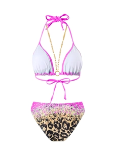 Detailed view of leopard print bikini bottom with gradient pink and gold tones