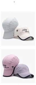 Gros plan sur la broderie Lucky Clovers et les coutures de la casquette de baseball