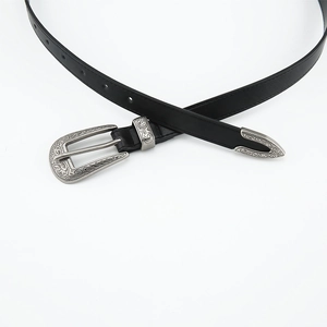 Vintage black leather belt for women with engraved antique silver metal buckle on white background