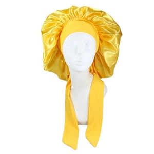 Front view of large yellow satin bonnet with long elastic ties on a white mannequin head