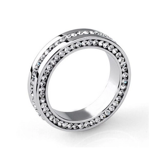 Macro shot of silver eternity ring with double rows of sparkling pave-set zircons