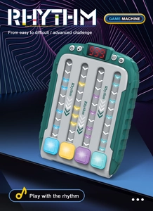 Detail of rhythm puzzle game console with LED score display and four glowing light buttons