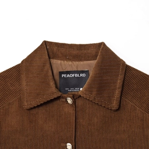 Vintage brown corduroy jacket for women with lapel collar and detailed texture view
