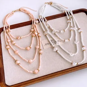French vintage multi-layer pearl necklace with flower accents and golden beads