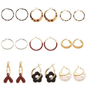 9-pair set of geometric hoop earrings featuring leopard print, pearl, and metallic designs