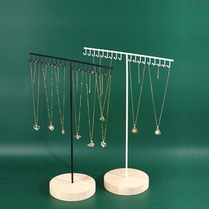 Dual-tier metal jewelry stand with wooden base for necklaces in black and white colors