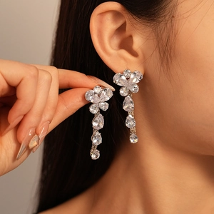 Silver dangling butterfly earrings with long tassels and sparkling zircon stones
