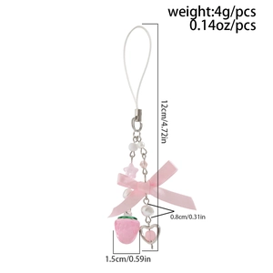 Detailed view of pink strawberry phone charm with ribbon bow and beaded chain dimensions
