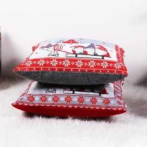 Christmas pillow covers with reindeer and gnome prints on linen fabric for holiday decor