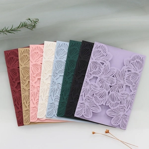 Laser cut floral invitation covers in various elegant colors and premium paper texture