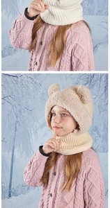 Detail of warm knit bear ears hat with plush faux fur trim and matching neck gaiter