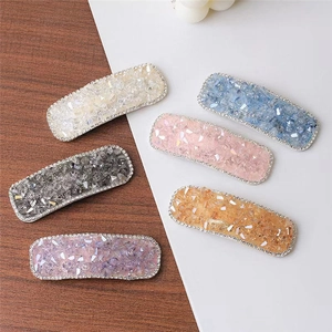 Colorful crystal rectangle hair clips with rhinestone edges in six vibrant candy colors