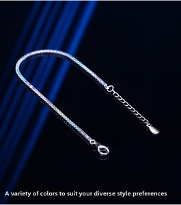 Detailed close-up of rainbow tennis bracelet showing S925 hallmark tag and secure lobster clasp