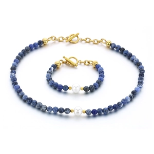 Handmade necklace and bracelet set with blue beads, white pearl and golden OT toggle clasp