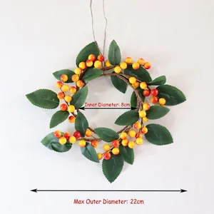 Artificial orange berry wreath with green leaves, 22cm outer diameter and 8cm inner ring