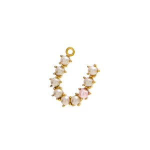Detailed macro of a horseshoe-shaped gold pendant with white and pink pearls