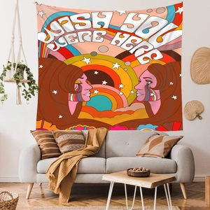 Detail showing high-quality retro psychedelic art tapestry with vibrant sun and face graphics