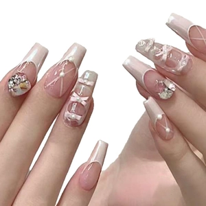 Pink pearlescent long coffin fake nails with white 3D bows and pearl accents