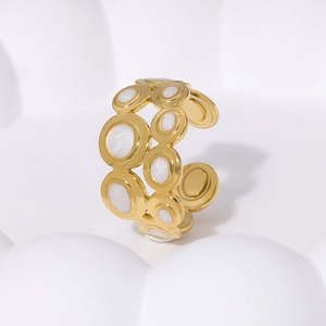 Detailed view of the 18K gold plated geometric open ring with white oval inlay shell