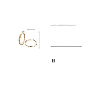 Detail view of 4cm gold hoop earrings featuring polished finish and side engraving