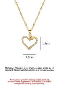 Detailed size view of luxury heart pendant with crystals on gold titanium steel chain
