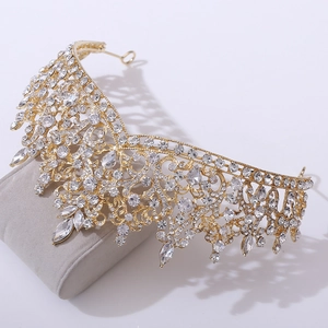 Luxurious gold bridal crown with sparkling crystal rhinestones and baroque metal details