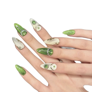 Melbourne green cat-eye press-on nails with glitter, rhinestones and silver details